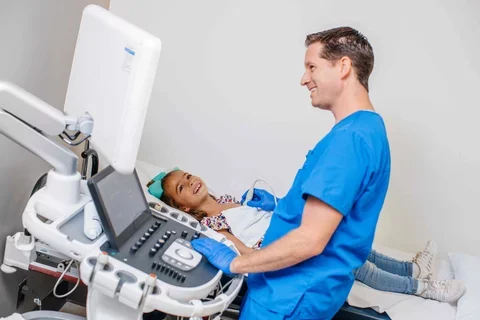 Pediatric doctor with child